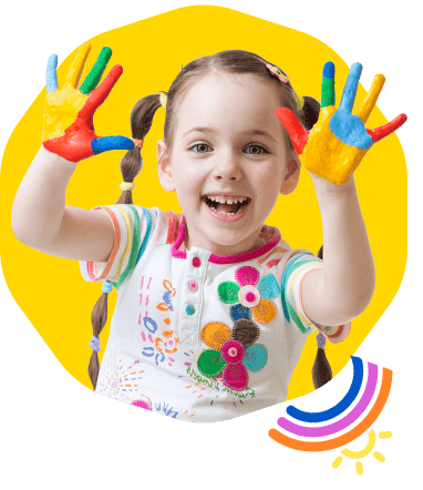Smiling girl showing colorful painted hands