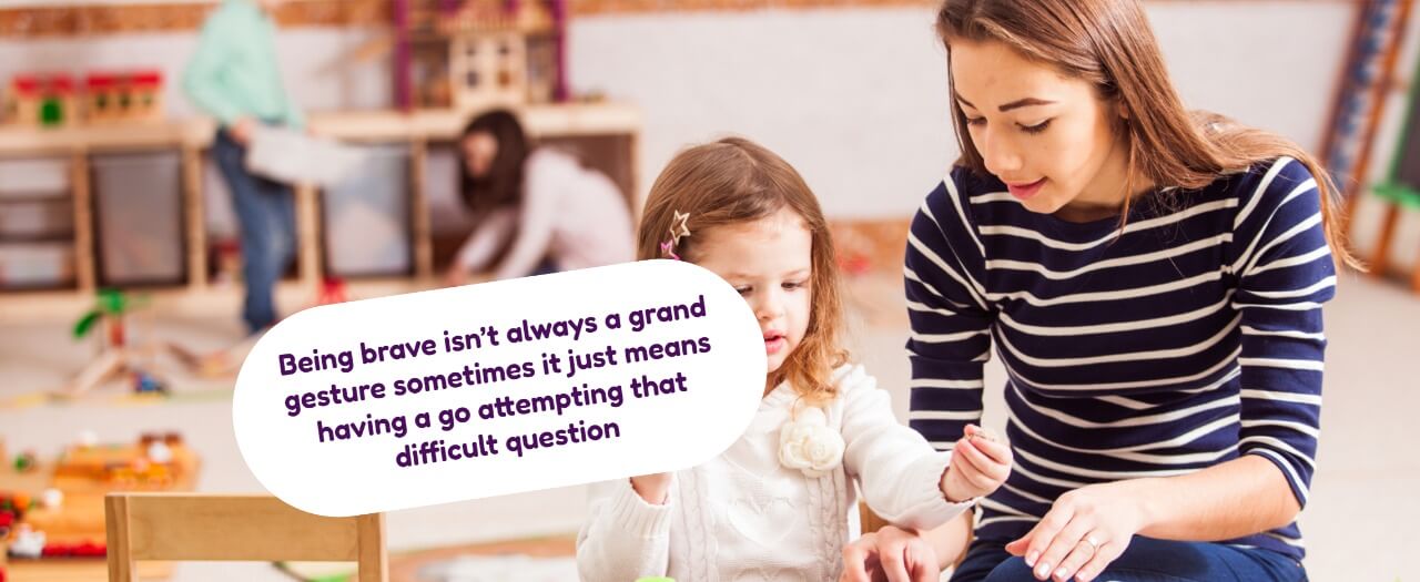 Teacher and child learning together in classroom
